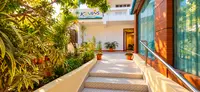 Entrance path and signboard of KEVINS Bed & Breakfast, Port Blair (Sri Vijaya Puram)